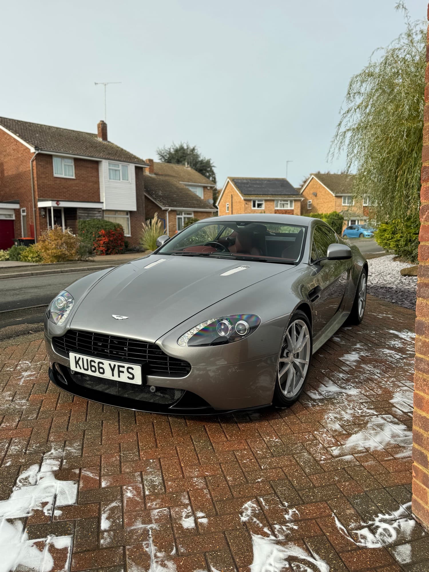 Aston Martin Vantage being safely washed during the snow-foam stage
